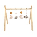 Wooden play arch with 4 toys