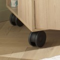 Set of 4 black casters for a freestanding baby dresser
